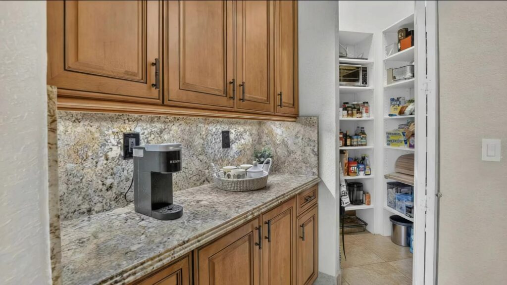 Service run with coffee bar and walk in pantry adjoining the kitchen