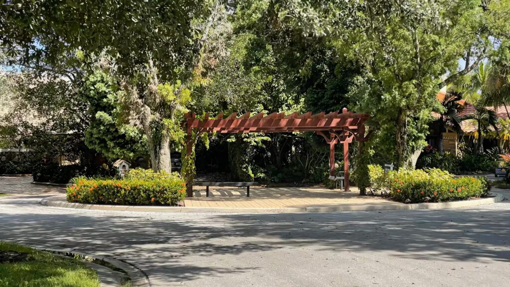 Wood pergola at a neighborhood gathering area near Maplewood Isle
