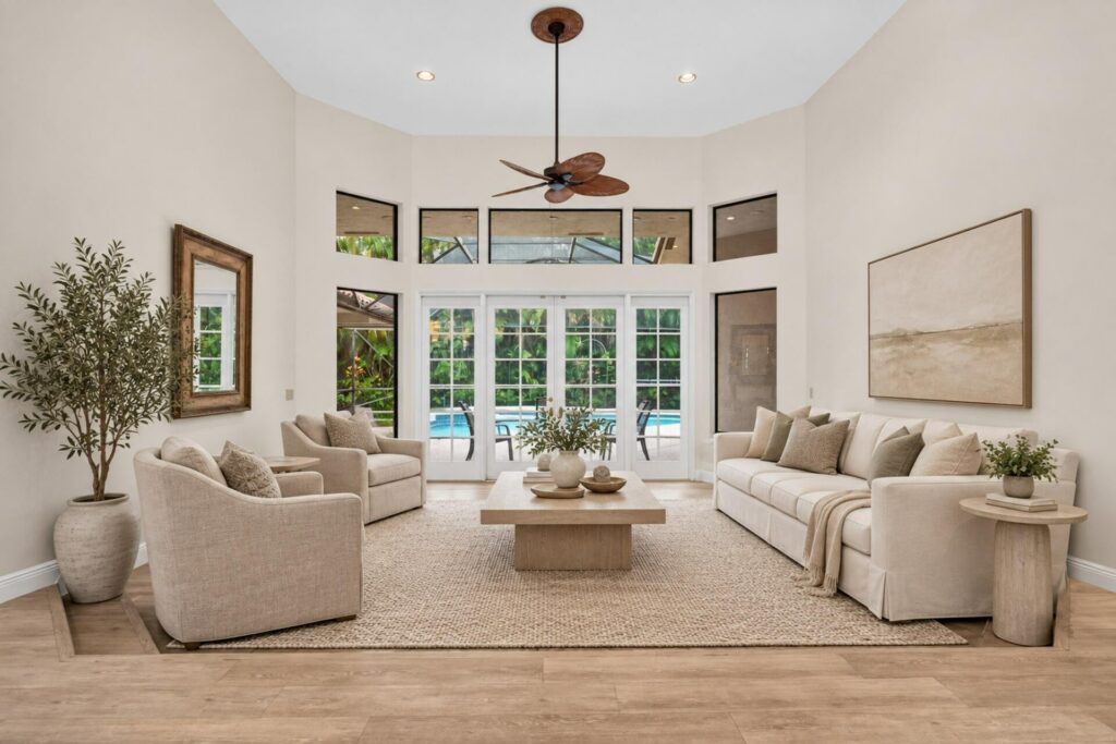 Formal living room shown with virtual staging